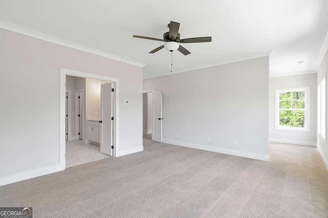 206 Grady Burrell Dr, Holly Springs, GA 30115 - unfurnished room with baseboards, a ceiling fan, light carpet, and ornamental molding