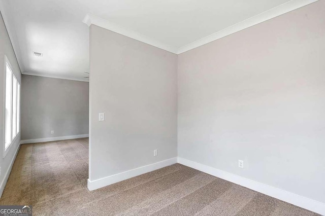 206 Grady Burrell Dr, Holly Springs, GA 30115 - carpeted empty room featuring ornamental molding and baseboards
