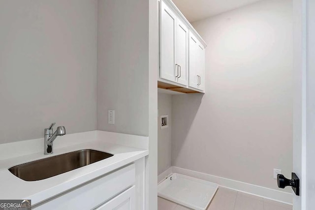 206 Grady Burrell Dr, Holly Springs, GA 30115 - laundry area with washer hookup and cabinet space