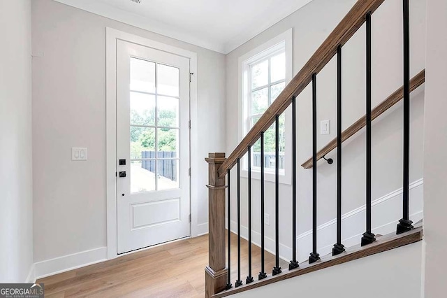 206 Grady Burrell Dr, Holly Springs, GA 30115 - foyer entrance with plenty of natural light, light wood-type flooring, stairway, and baseboards