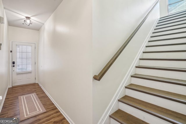 426 Mulberry Row SE, Atlanta, GA 30354 - doorway to outside featuring stairs, wood finished floors, and healthy amount of natural light