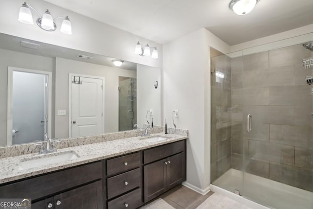 426 Mulberry Row SE, Atlanta, GA 30354 - full bathroom with a stall shower, double vanity, and tile patterned flooring
