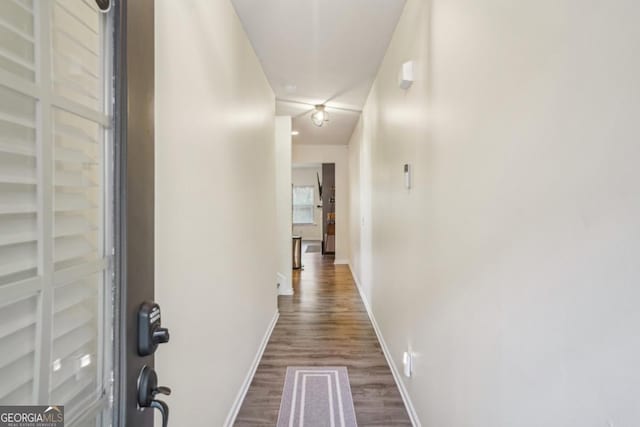 426 Mulberry Row SE, Atlanta, GA 30354 - hall with dark wood-style flooring and baseboards