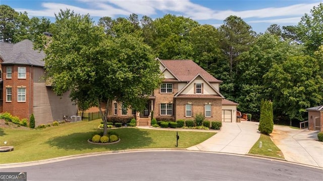 9065 Yellow Pine Ct, Gainesville, GA 30506 - view of front of home featuring concrete driveway, a front lawn, and brick siding
