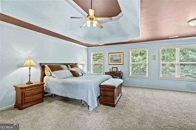 9065 Yellow Pine Ct, Gainesville, GA 30506 - carpeted bedroom featuring a tray ceiling and ceiling fan