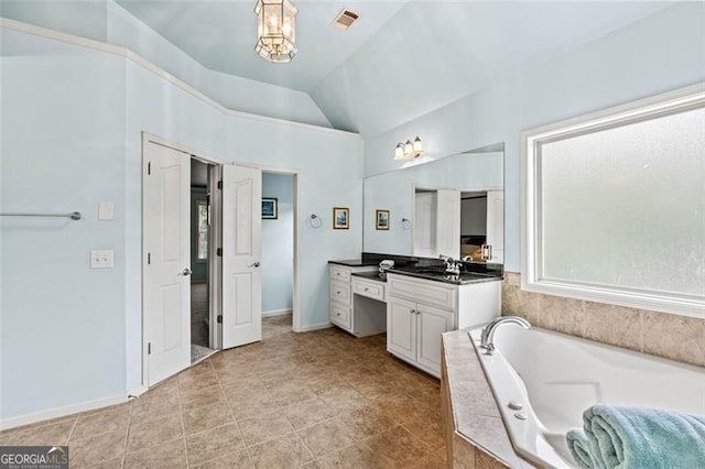 9065 Yellow Pine Ct, Gainesville, GA 30506 - bathroom featuring vanity, a bath, and vaulted ceiling