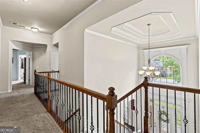 9065 Yellow Pine Ct, Gainesville, GA 30506 - hallway with ornamental molding, a chandelier, carpet flooring, and an upstairs landing