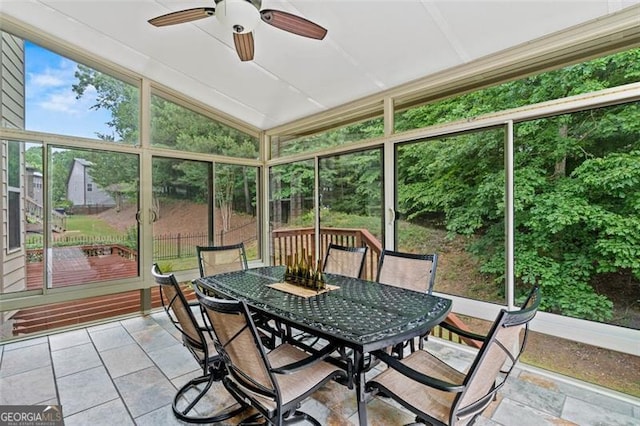 9065 Yellow Pine Ct, Gainesville, GA 30506 - sunroom featuring a ceiling fan, outdoor dining space, and vaulted ceiling
