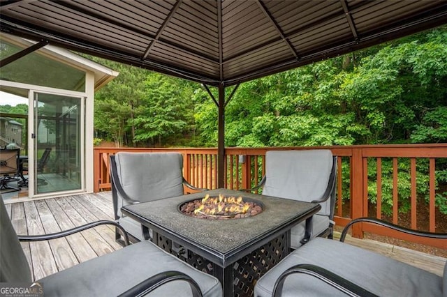 9065 Yellow Pine Ct, Gainesville, GA 30506 - wooden deck featuring an outdoor fire pit and a gazebo