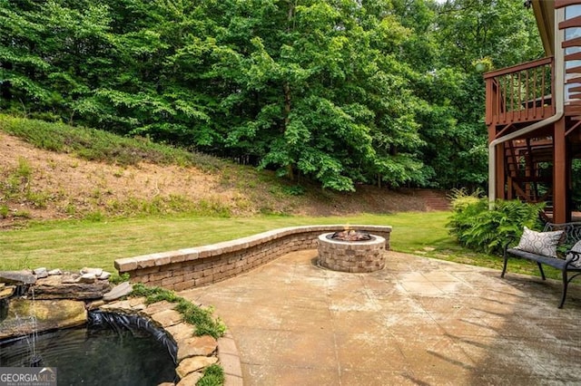 9065 Yellow Pine Ct, Gainesville, GA 30506 - view of patio / terrace with a fire pit and stairs