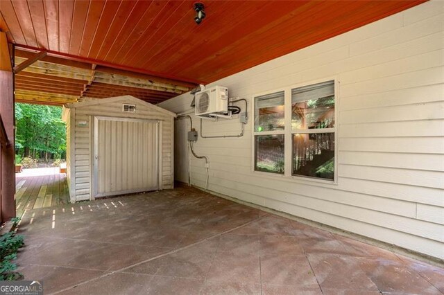 9065 Yellow Pine Ct, Gainesville, GA 30506 - view of patio / terrace with a shed