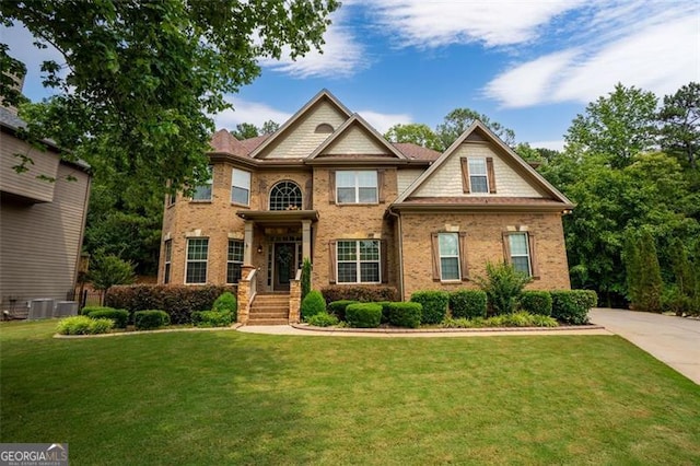 9065 Yellow Pine Ct, Gainesville, GA 30506 - view of front of home with a front lawn and brick siding