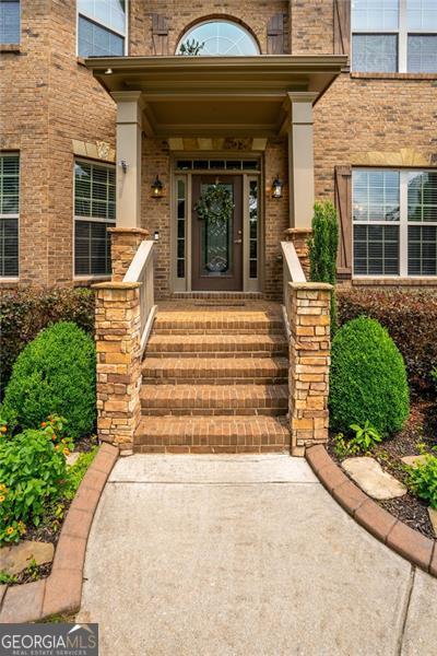 9065 Yellow Pine Ct, Gainesville, GA 30506 - property entrance featuring brick siding