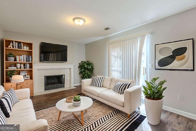 2105 Sandtree Ct SW, Atlanta, GA 30331 - living area with wood finished floors and a tile fireplace