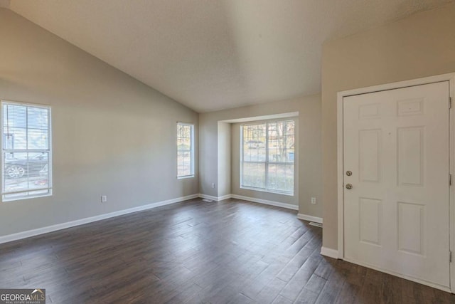 2105 Sandtree Ct SW, Atlanta, GA 30331 - foyer entrance with vaulted ceiling and dark wood-style flooring