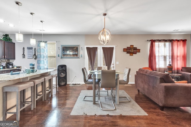 3929 Makeover Ct Unit 0, Atlanta, GA 30349 - dining area with dark wood finished floors, a chandelier, baseboards, and recessed lighting