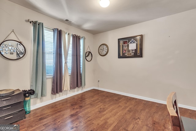 3929 Makeover Ct Unit 0, Atlanta, GA 30349 - spare room featuring wood finished floors and baseboards