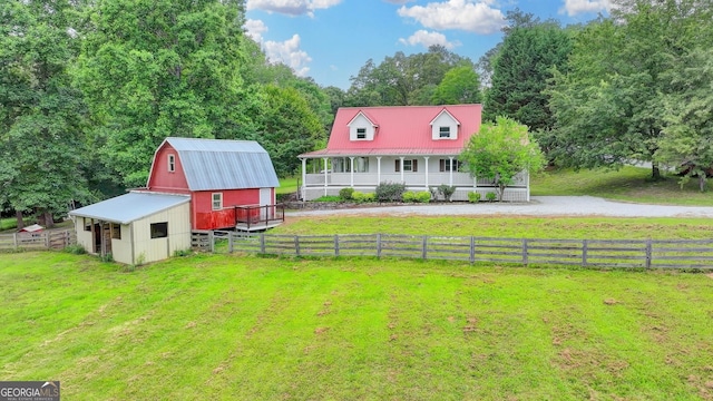 1365 Lower Creighton Rd, Cumming, GA 30028 - view of front of home featuring a barn, an outbuilding, a porch, and a metal roof