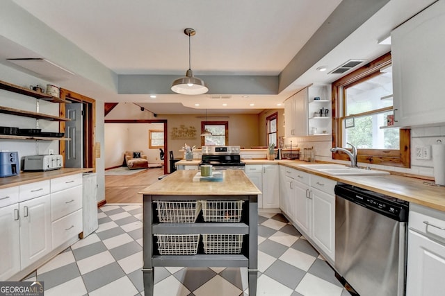 1365 Lower Creighton Rd, Cumming, GA 30028 - kitchen featuring appliances with stainless steel finishes, open shelves, light floors, and wood counters
