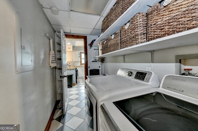 1365 Lower Creighton Rd, Cumming, GA 30028 - washroom featuring washing machine and dryer, light floors, and electric panel