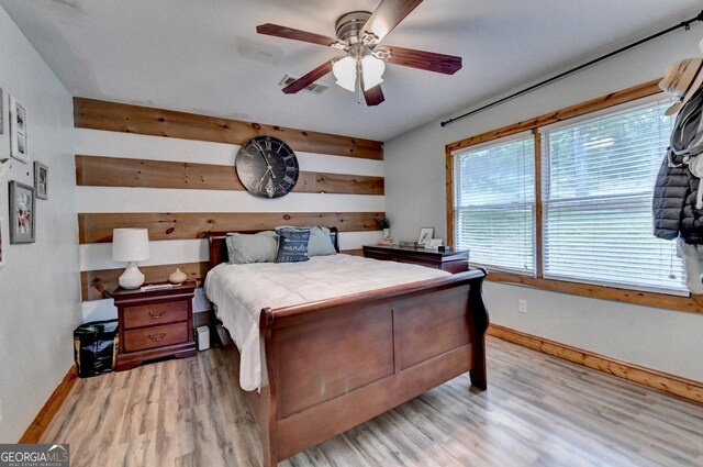 1365 Lower Creighton Rd, Cumming, GA 30028 - bedroom featuring light wood-type flooring and a ceiling fan