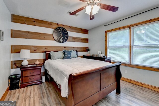 1365 Lower Creighton Rd, Cumming, GA 30028 - bedroom with light wood-type flooring and a ceiling fan