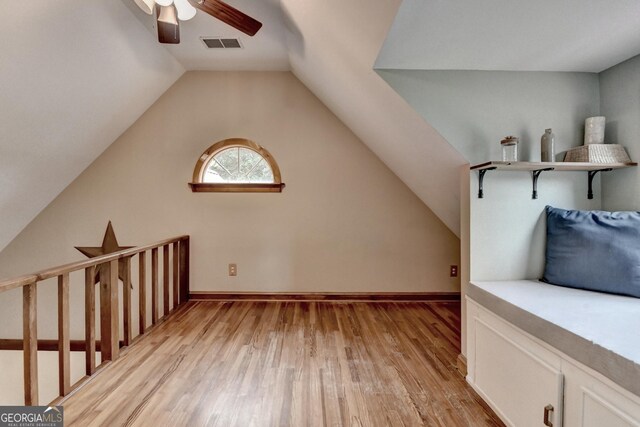 1365 Lower Creighton Rd, Cumming, GA 30028 - bonus room featuring ceiling fan, light wood-style floors, and vaulted ceiling