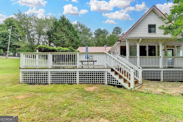1365 Lower Creighton Rd, Cumming, GA 30028 - view of grassy yard featuring a deck