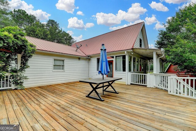 1365 Lower Creighton Rd, Cumming, GA 30028 - wooden deck with a sunroom
