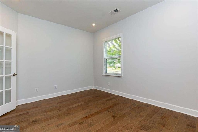 740 Pineberry Ct, Grayson, GA 30017 - empty room with wood finished floors and recessed lighting