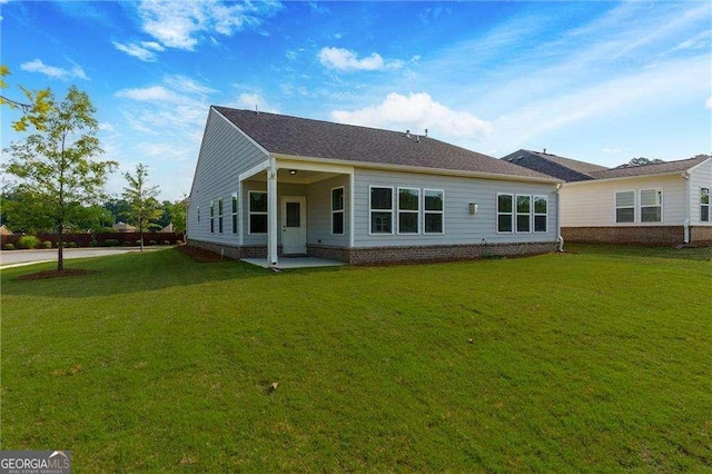 740 Pineberry Ct, Grayson, GA 30017 - back of property with a lawn
