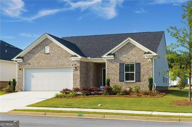 740 Pineberry Ct, Grayson, GA 30017 - view of front of property with a garage, brick siding, concrete driveway, a front lawn, and roof with shingles
