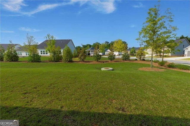 740 Pineberry Ct, Grayson, GA 30017 - view of grassy yard featuring a residential view