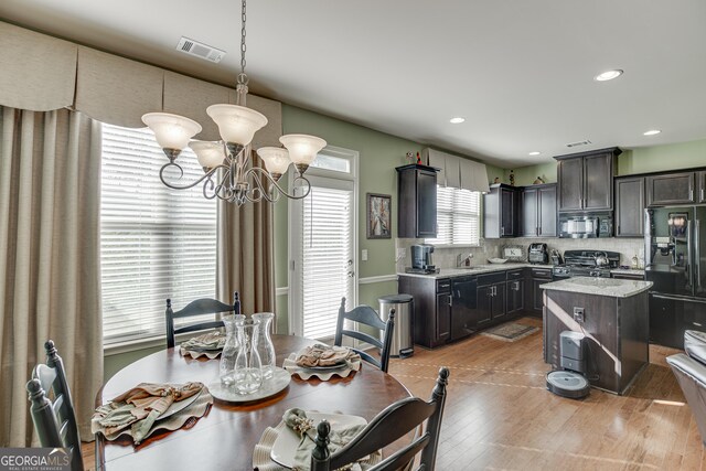 3393 Sardis Bend Dr, Buford, GA 30519 - dining space featuring a chandelier, light wood-style floors, and recessed lighting