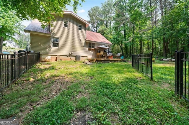76 Beech Creek Cir, Winder, GA 30680 - rear view of house featuring a wooden deck, metal roof, and crawl space