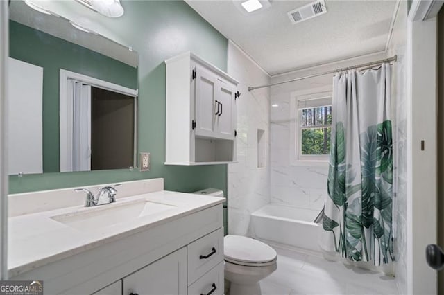 76 Beech Creek Cir, Winder, GA 30680 - bathroom with toilet, vanity, shower / bath combination with curtain, and a textured ceiling