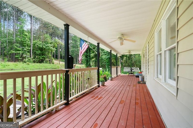 76 Beech Creek Cir, Winder, GA 30680 - wooden porch featuring ceiling fan and a lawn