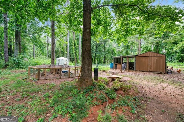76 Beech Creek Cir, Winder, GA 30680 - view of yard featuring an outdoor structure