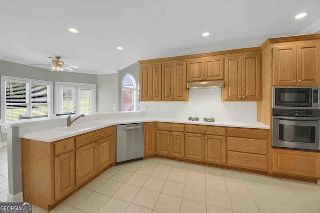 718 First Cotton Dr, Powder Springs, GA 30127 - kitchen with appliances with stainless steel finishes, a peninsula, light countertops, a ceiling fan, and recessed lighting