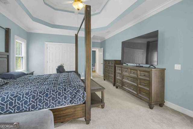 718 First Cotton Dr, Powder Springs, GA 30127 - bedroom featuring carpet flooring, crown molding, a ceiling fan, and a raised ceiling