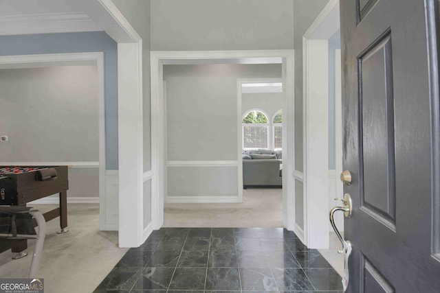 718 First Cotton Dr, Powder Springs, GA 30127 - entrance foyer with dark marble finish flooring and ornamental molding