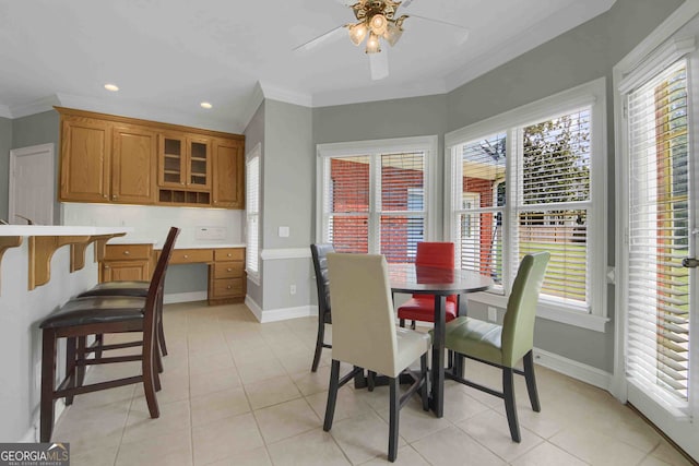 718 First Cotton Dr, Powder Springs, GA 30127 - dining space with crown molding, ceiling fan, light tile patterned floors, and recessed lighting
