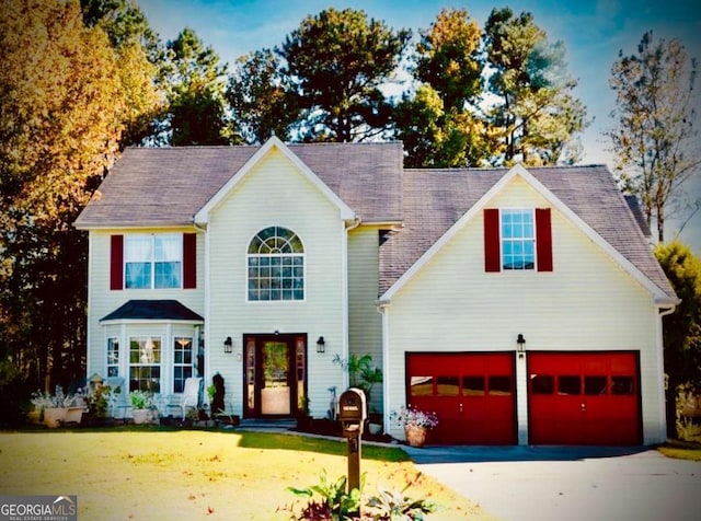 475 Cascade Rise Ct, South Fulton, GA 30331 - view of front of home featuring driveway, a front yard, and an attached garage
