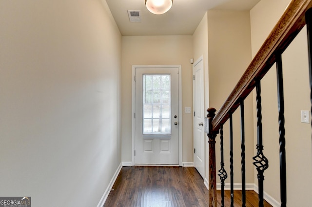 5831 Taka Ln, Lithonia, GA 30038 - foyer with dark wood finished floors, baseboards, and stairs