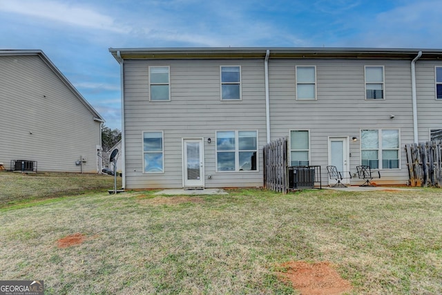 5831 Taka Ln, Lithonia, GA 30038 - rear view of house with a lawn and cooling unit