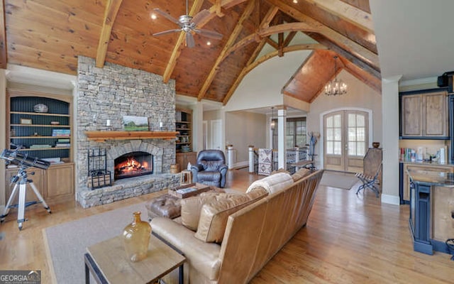 2156 Mockingbird Ln, Hiawassee, GA 30546 - living room featuring a ceiling fan, wood finished floors, a fireplace, french doors, and baseboards
