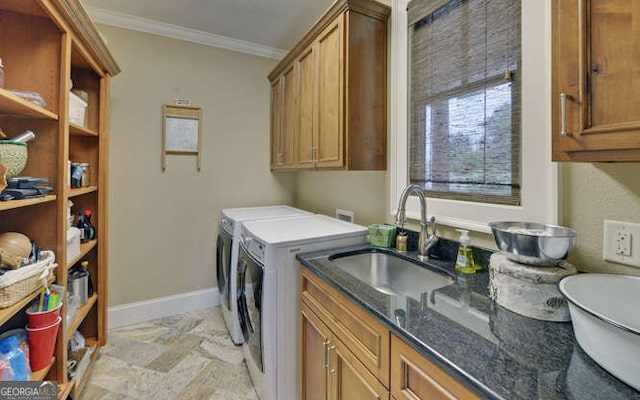 2156 Mockingbird Ln, Hiawassee, GA 30546 - washroom featuring separate washer and dryer, crown molding, baseboards, cabinet space, and light stone finish flooring