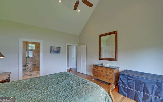 2156 Mockingbird Ln, Hiawassee, GA 30546 - bedroom with high vaulted ceiling, wood finished floors, baseboards, a ceiling fan, and connected bathroom