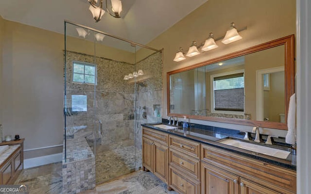 2156 Mockingbird Ln, Hiawassee, GA 30546 - bathroom featuring double vanity, a shower stall, and a chandelier