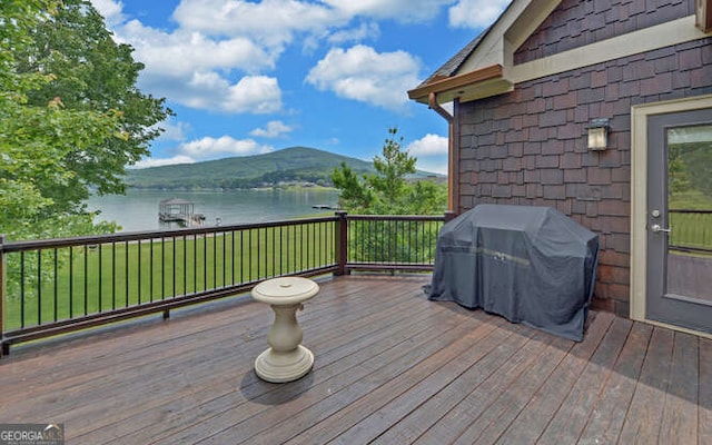 2156 Mockingbird Ln, Hiawassee, GA 30546 - wooden terrace with a water and mountain view, area for grilling, and a lawn